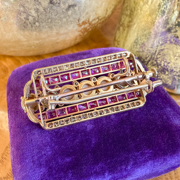 Victorian Pearl, Ruby & Diamond Pin sold by Doyle and Doyle an antique and vintage jewelry boutique