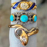 Three antique gold rings set with turquoise, diamonds, and enamel, from Doyle & Doyle antique and vintage jewelry boutique