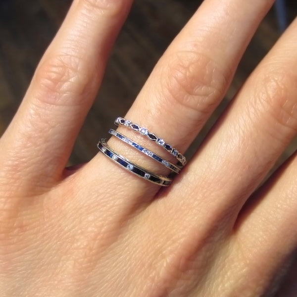 Three diamond and sapphire eternity wedding band rings from Doyle & Doyle jewelry