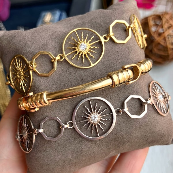 Gold & Silver Diamond Sunburst Bracelets, with vintage gold bracelet, all from Doyle & Doyle