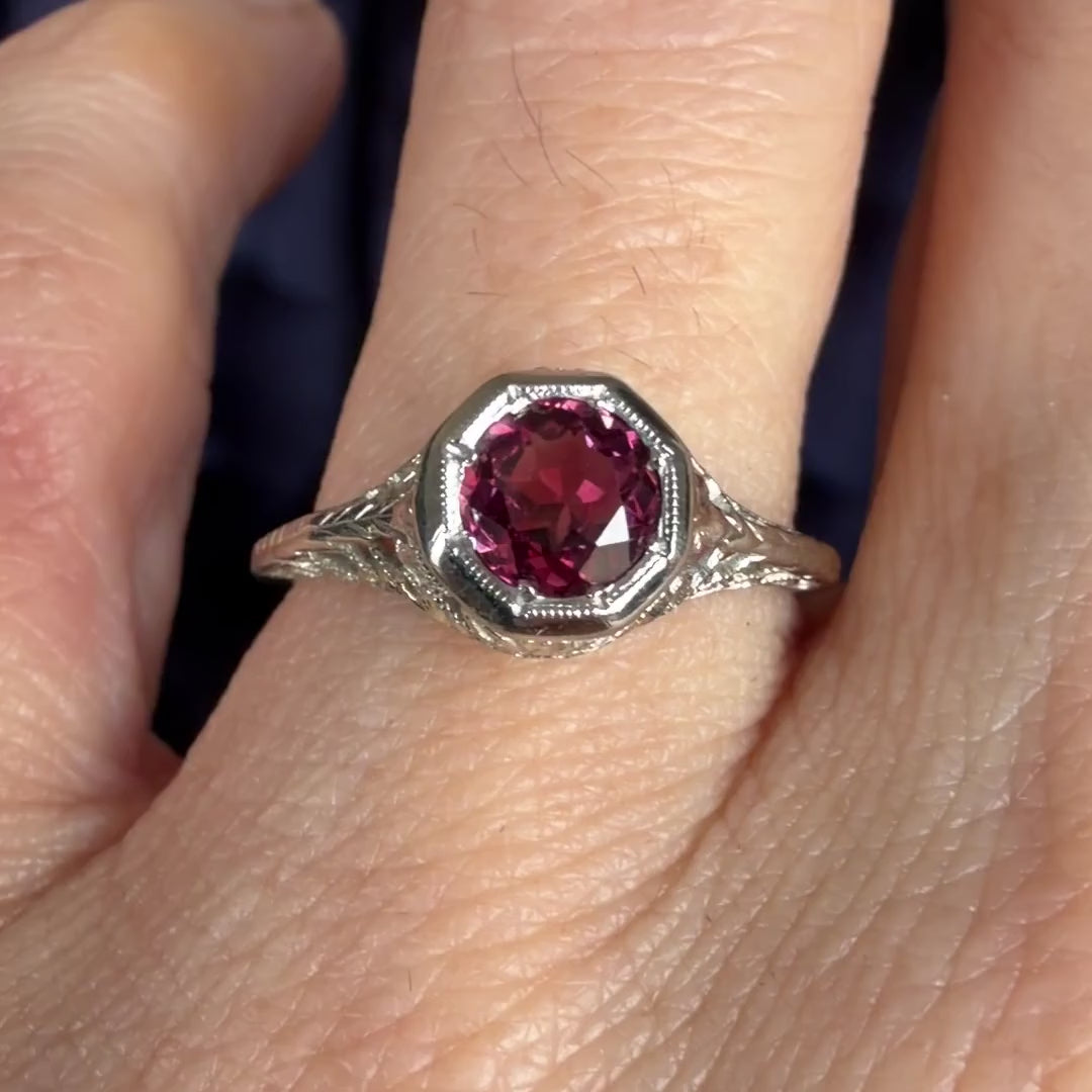 Vintage Filigree Garnet Ring sold by Doyle and Doyle an antique and vintage jewelry boutique