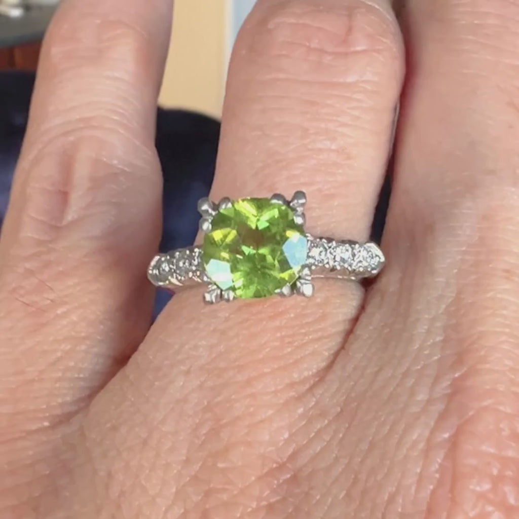 Vintage Peridot & Diamond Ring, 1.75ct. sold by Doyle and Doyle an antique and vintage jewelry boutique