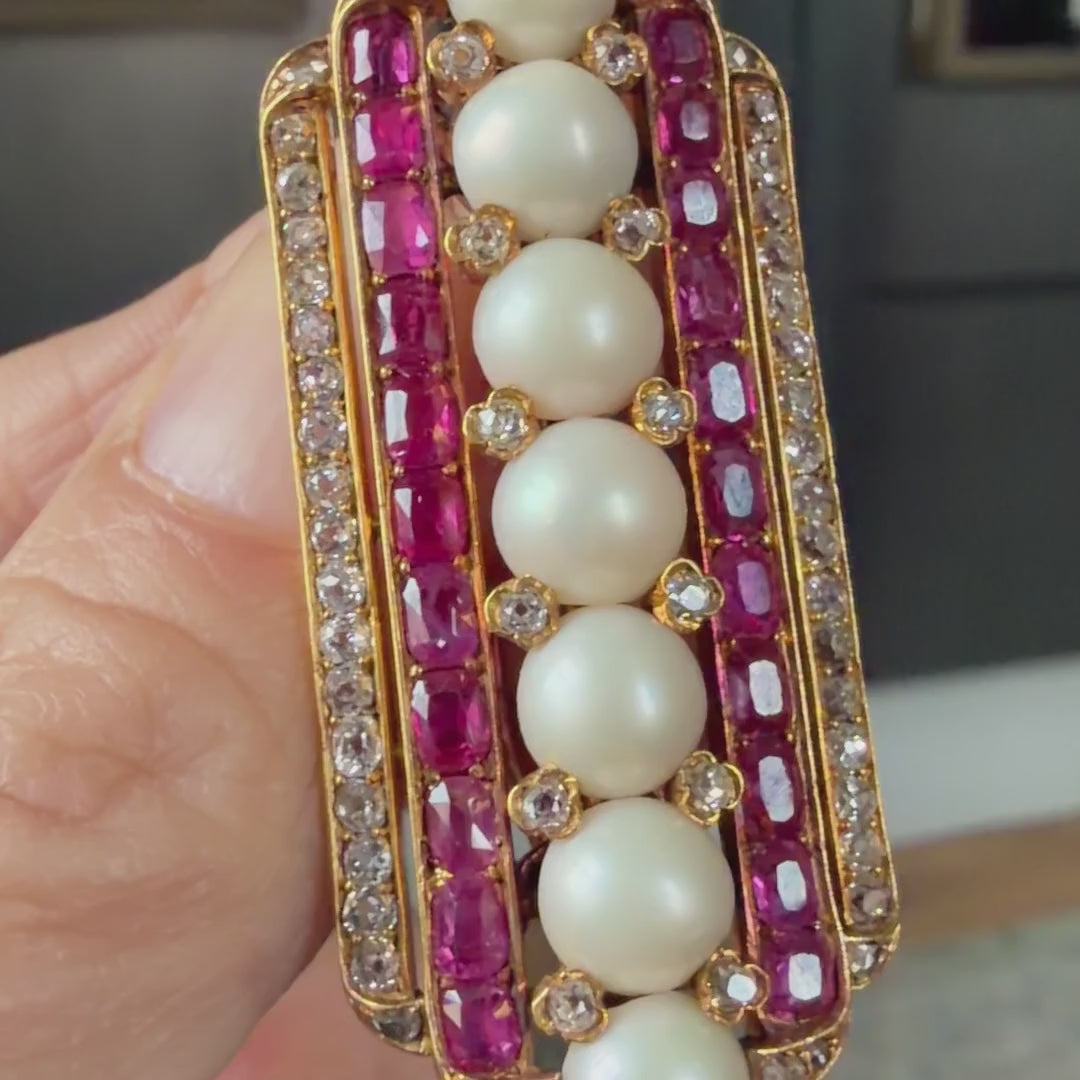 Victorian Pearl, Ruby & Diamond Pin sold by Doyle and Doyle an antique and vintage jewelry boutique