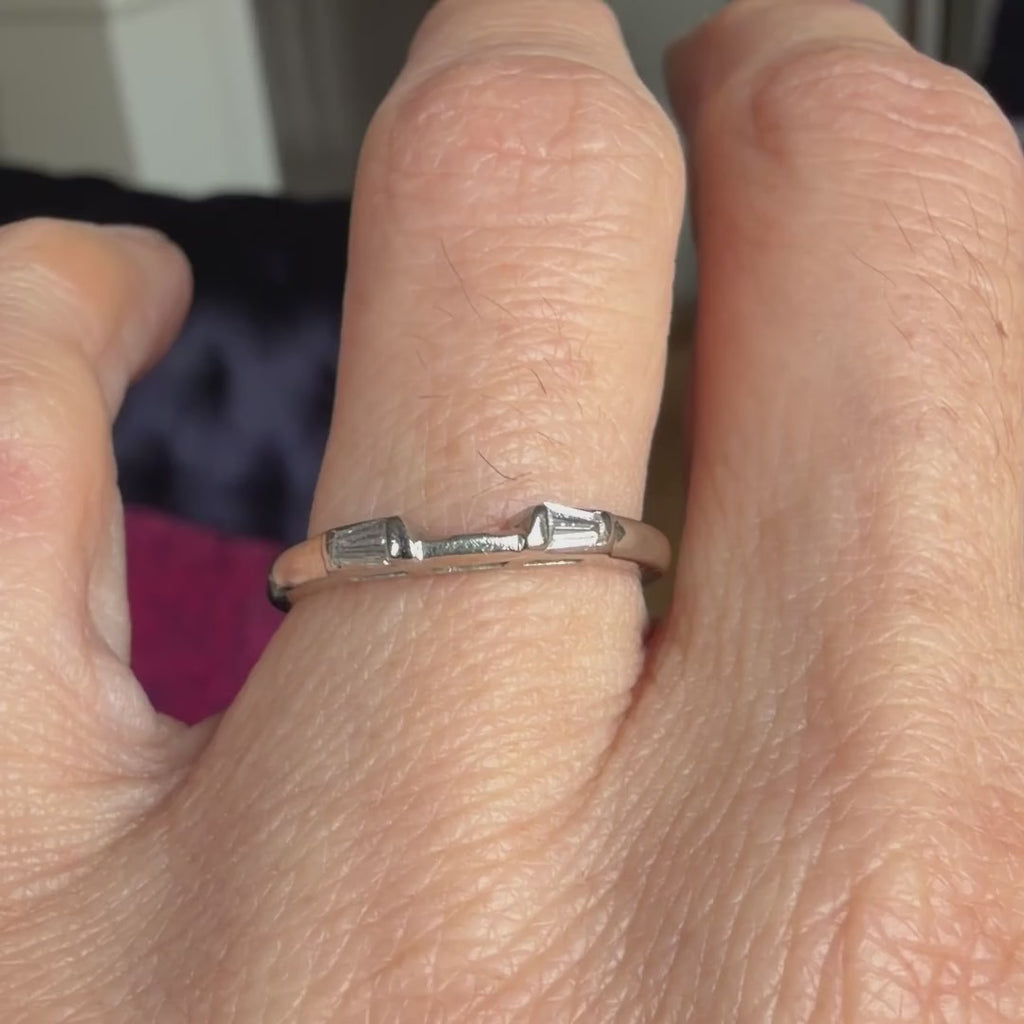 Vintage contoured wedding band set with tapered baguette diamonds, sold by Doyle & Doyle antique and vintage jewelry boutique