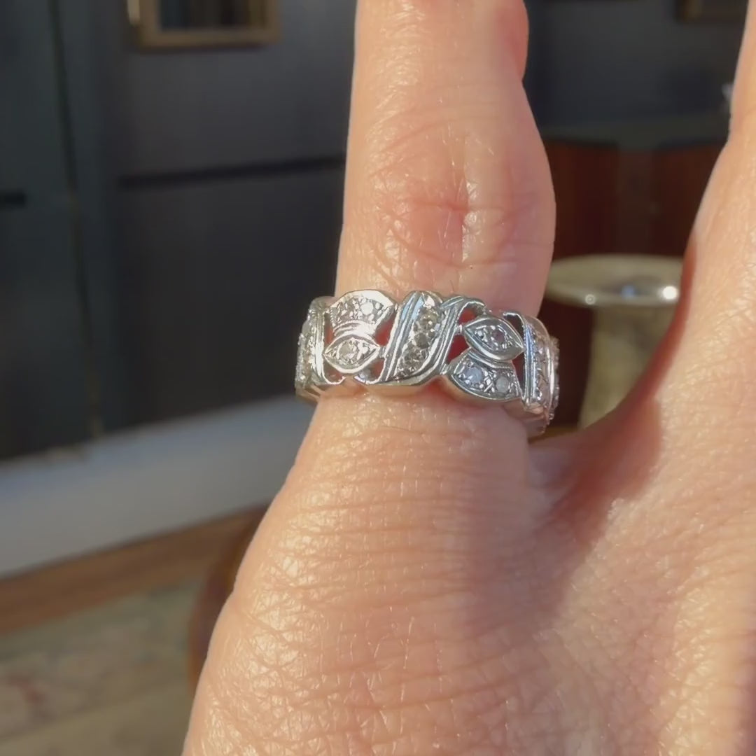Vintage Wide Patterned Diamond Eternity Band sold by Doyle and Doyle an antique and vintage jewelry boutique