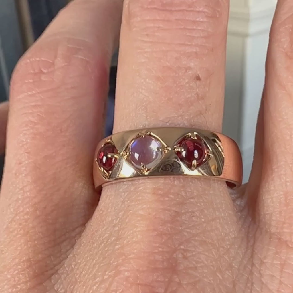 Vintage Moonstone & Garnet Ring sold by Doyle and Doyle an antique and vintage jewelry boutique