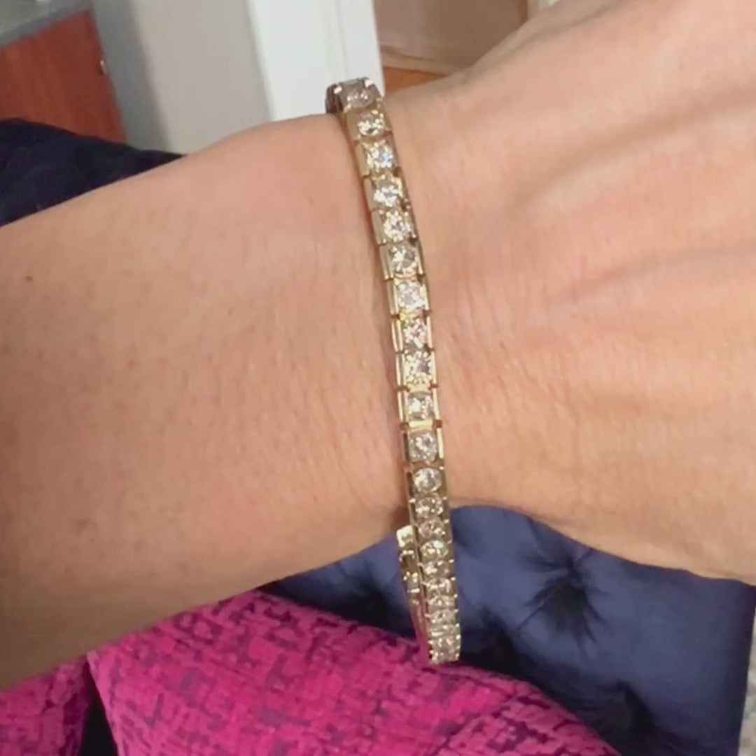 Vintage Diamond Tennis Bracelet sold by Doyle and Doyle an antique and vintage jewelry boutique