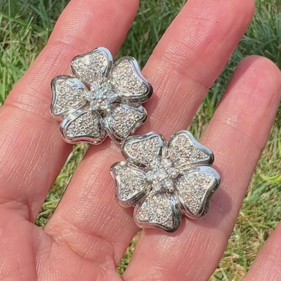 Vintage Pave Set Flower Diamond Earrings sold by Doyle and Doyle an antique and vintage jewelry boutique
