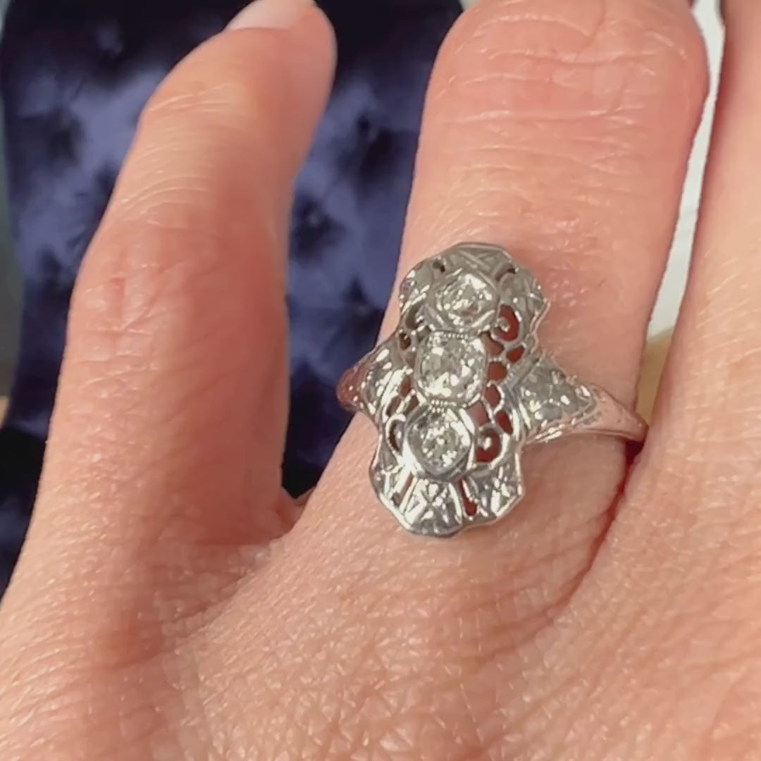 Vintage Filigree Diamond Dinner Ring sold by Doyle and Doyle an antique and vintage jewelry boutique