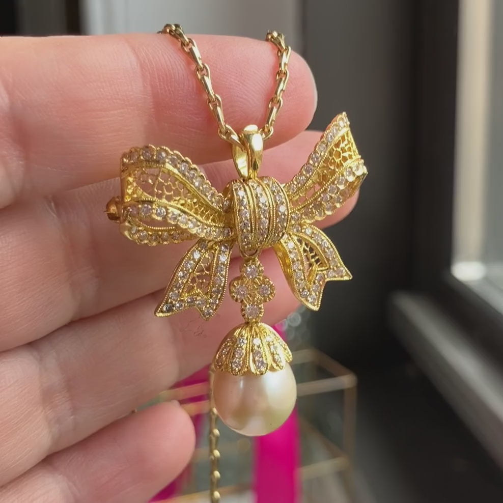 Vintage Diamond & Pearl Drop Bow Pendant sold by Doyle and Doyle an antique and vintage jewelry boutique