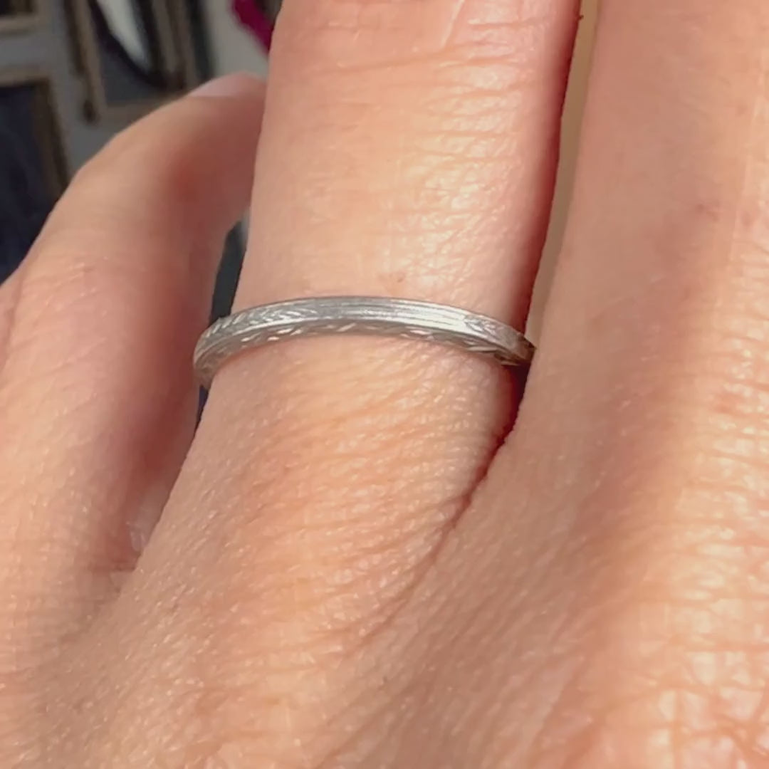 Vintage Patterned Platinum Wedding Band sold by Doyle and Doyle an antique and vintage jewelry boutique