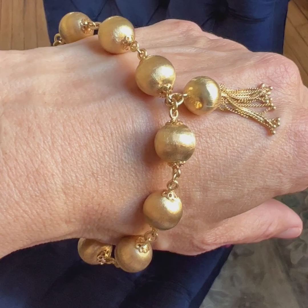 Vintage Gold Bead & Tassel Bracelet sold by Doyle and Doyle an antique and vintage jewelry boutique
