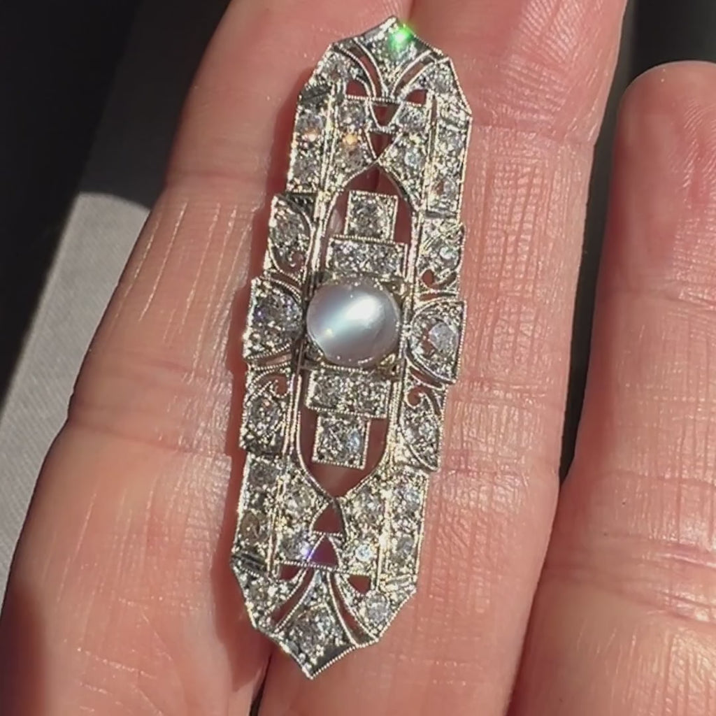 Art Deco Moonstone & Diamond Pin sold by Doyle and Doyle an antique and vintage jewelry boutique