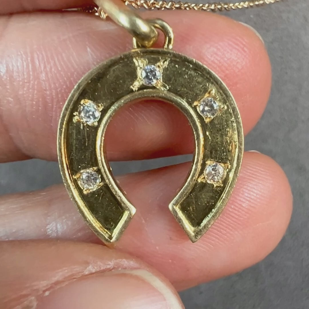 Vintage Diamond Horseshoe Pendant sold by Doyle and Doyle an antique and vintage jewelry boutique