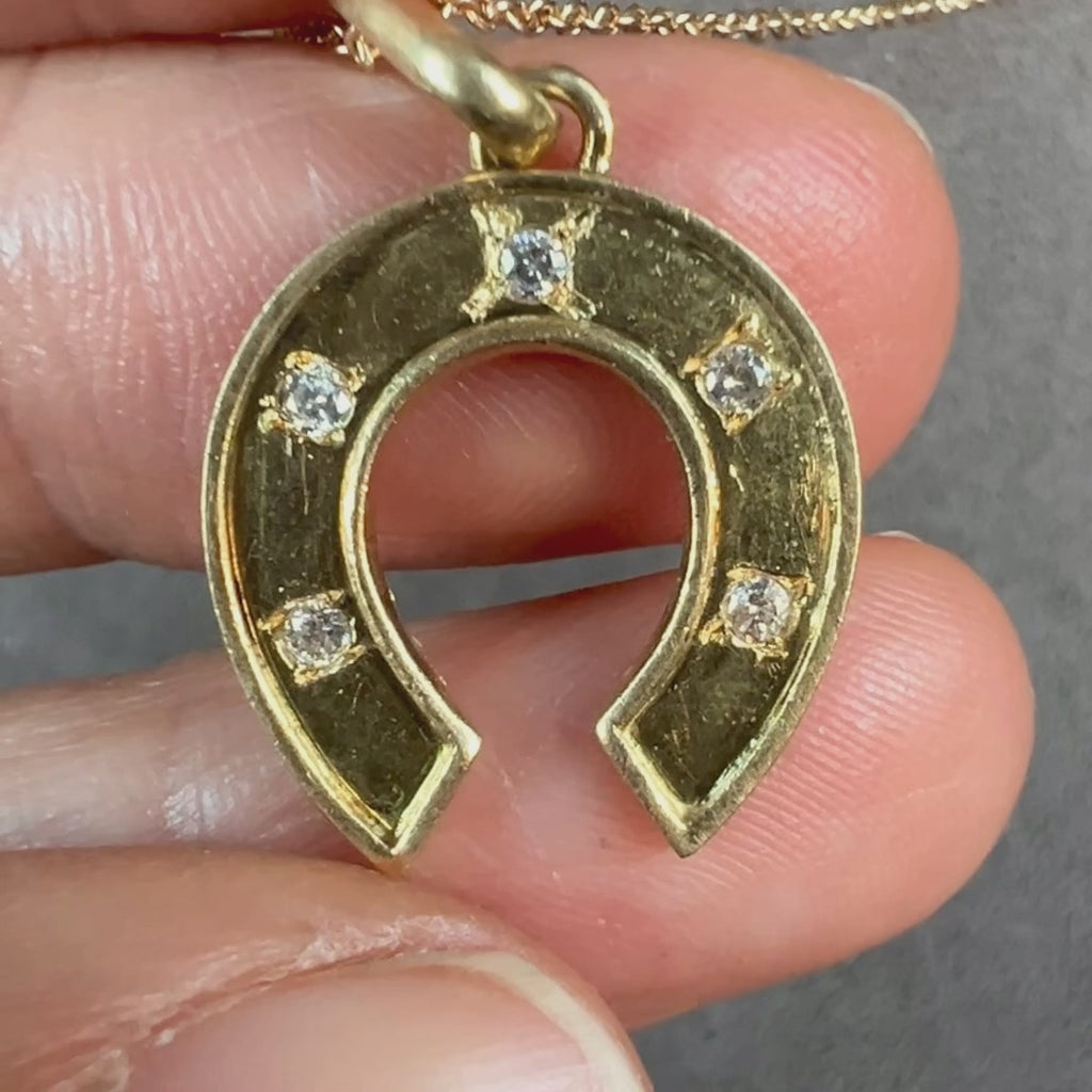 Vintage Diamond Horseshoe Pendant sold by Doyle and Doyle an antique and vintage jewelry boutique