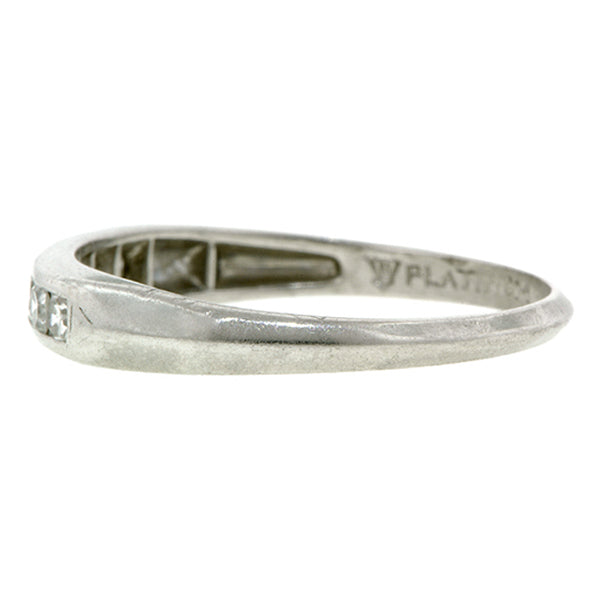 Vintage ring: a Platinum Diamond Wedding Band sold by Doyle & Doyle vintage and antique jewelry boutique.