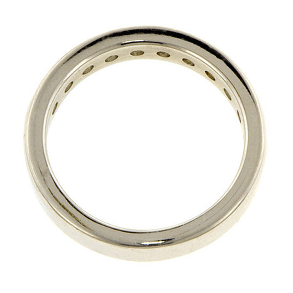 Estate ring: a Platinum Round Brilliant Cut Diamond Wedding Band sold by Doyle & Doyle vintage and antique jewelry boutique.