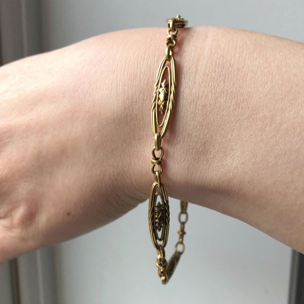 Edwardian bracelet: a Yellow Gold Ornate Link Bracelet sold by Doyle & Doyle vintage and antique jewelry boutique.