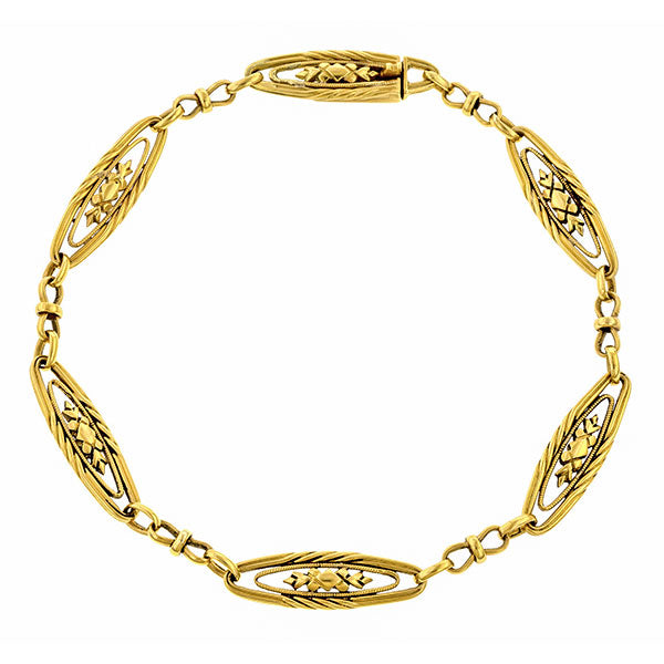 Edwardian bracelet: a Yellow Gold Ornate Link Bracelet sold by Doyle & Doyle vintage and antique jewelry boutique.