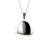 Classic round white gold locket, from Doyle & Doyle.