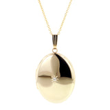 Oval Diamond Set Engraved Star Locket sold by Doyle & Doyle an antique & vintage jewelry boutique.