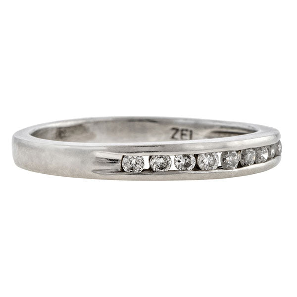 Estate ring: a Platinum Wedding Band With Round Brilliant Cut Diamonds sold by Doyle & Doyle vintage and antique jewelry boutique. 