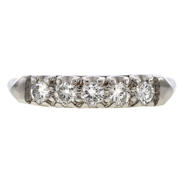 Vintage ring: a Platinum Wedding Band With Round Brilliant Cut Diamonds sold by Doyle & Doyle vintage and antique jewelry boutique.