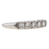 Vintage ring: a Platinum Wedding Band With Round Brilliant Cut Diamonds sold by Doyle & Doyle vintage and antique jewelry boutique.