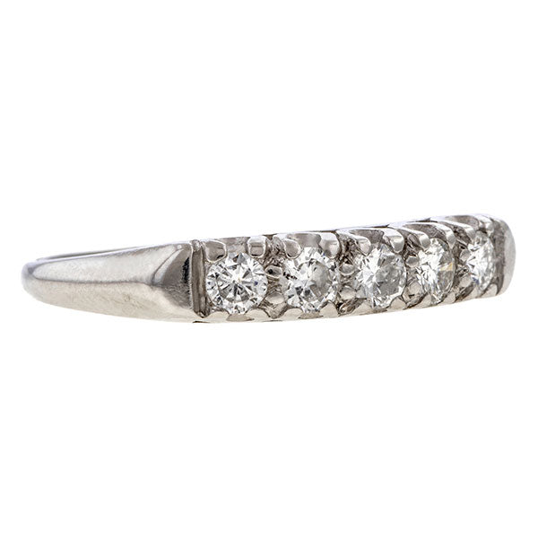 Vintage ring: a Platinum Wedding Band With Round Brilliant Cut Diamonds sold by Doyle & Doyle vintage and antique jewelry boutique.