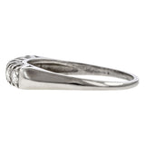 Vintage ring: a Platinum Wedding Band With Round Brilliant Cut Diamonds sold by Doyle & Doyle vintage and antique jewelry boutique.