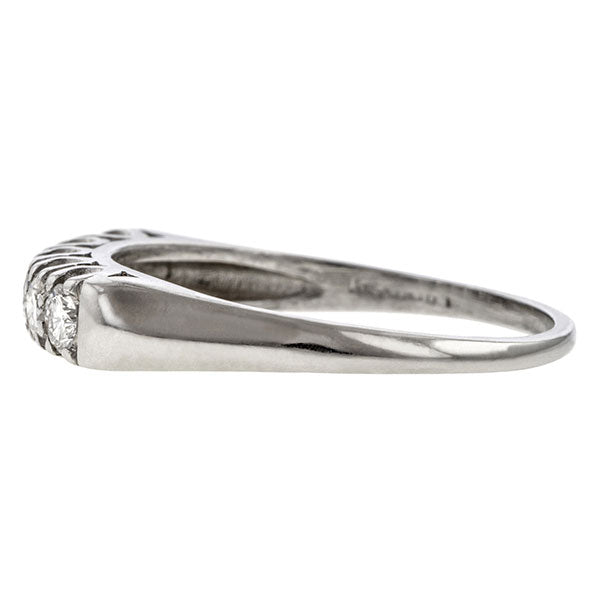 Vintage ring: a Platinum Wedding Band With Round Brilliant Cut Diamonds sold by Doyle & Doyle vintage and antique jewelry boutique.