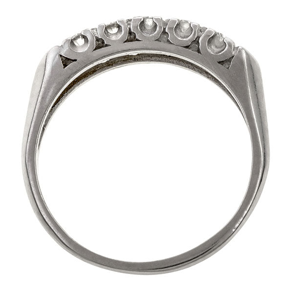 Vintage ring: a Platinum Wedding Band With Round Brilliant Cut Diamonds sold by Doyle & Doyle vintage and antique jewelry boutique.