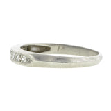 Vintage ring: a Platinum Diamond Wedding Band sold by Doyle & Doyle vintage and antique jewelry boutique.