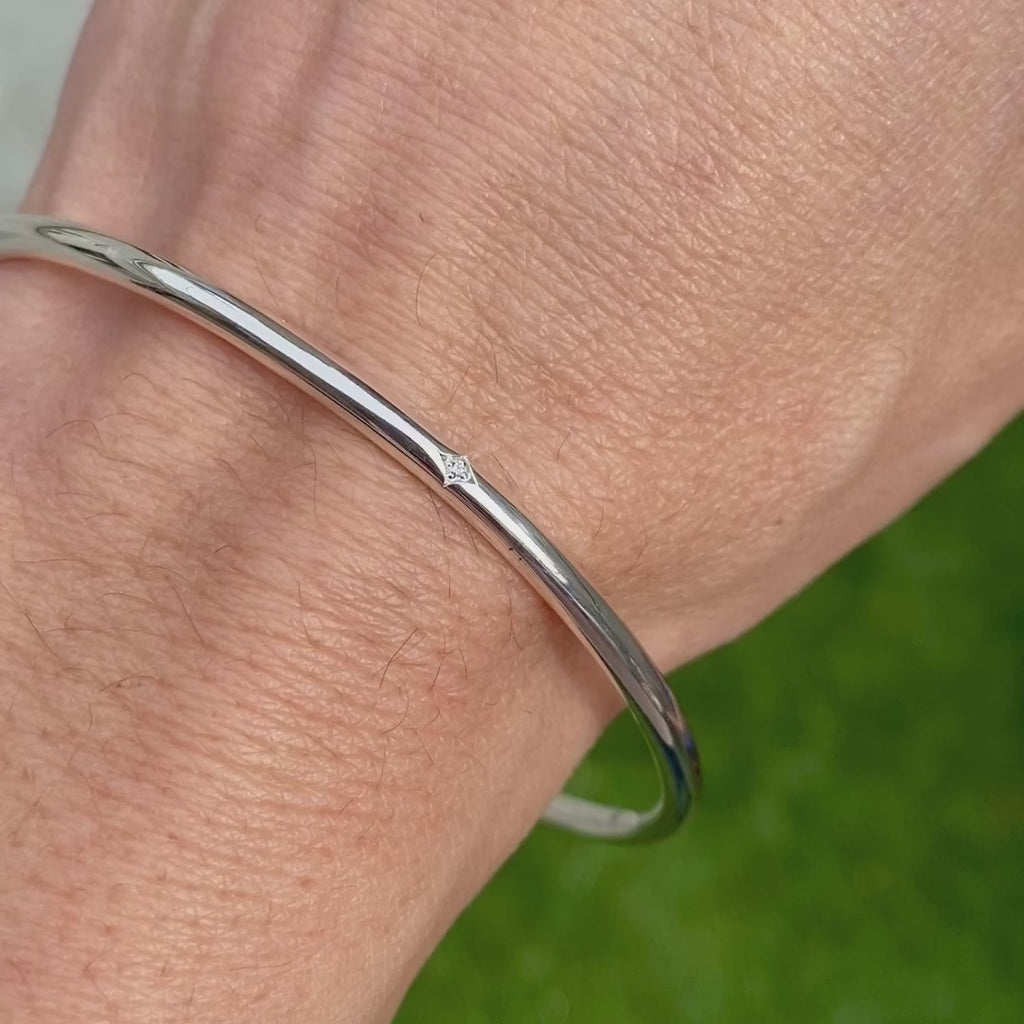 Single Station Diamond Bangle Bracelet sold by Doyle and Doyle an antique and vintage jewelry boutique