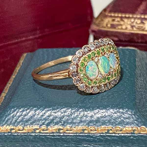 Edwardian Opal, Demantoid & Diamond Ring sold by Doyle and Doyle an antique and vintage jewelry boutique
