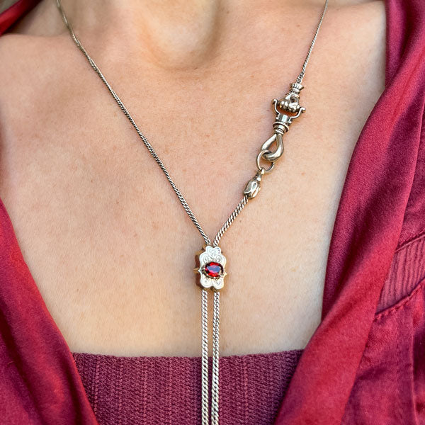 Victorian Long Chain with Garnet Slide sold by Doyle and Doyle an antique and vintage jewelry boutique