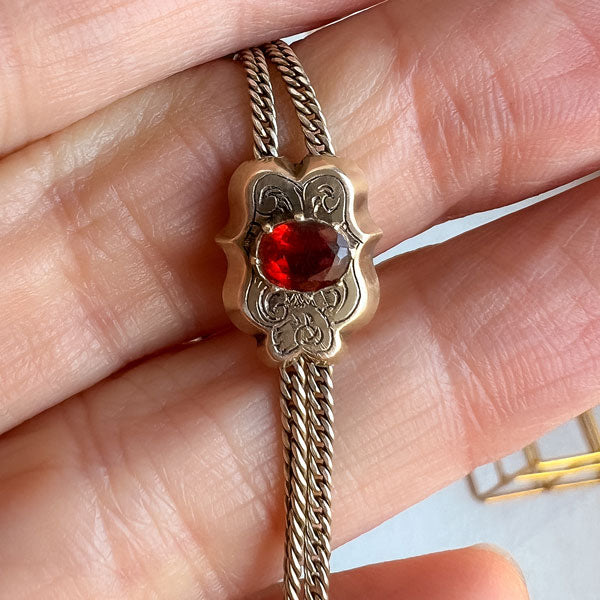 Victorian Long Chain with Garnet Slide sold by Doyle and Doyle an antique and vintage jewelry boutique