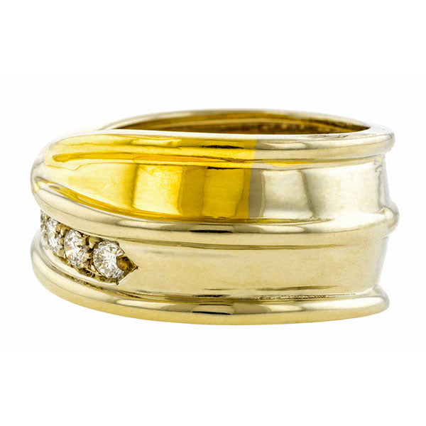 Vintage ring: a Yellow & White Two-tone Gold Diamond Crossover Wedding Band sold by Doyle & Doyle vintage and antique jewelry boutique.