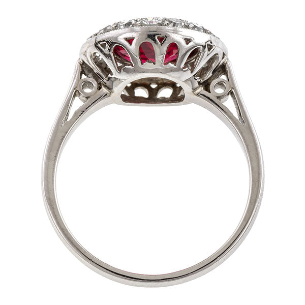 Estate ring: a Platinum Red Spinel And Diamond Halo 2.27ct. Engagement Ring sold by Doyle & Doyle vintage and antique jewelry boutique.