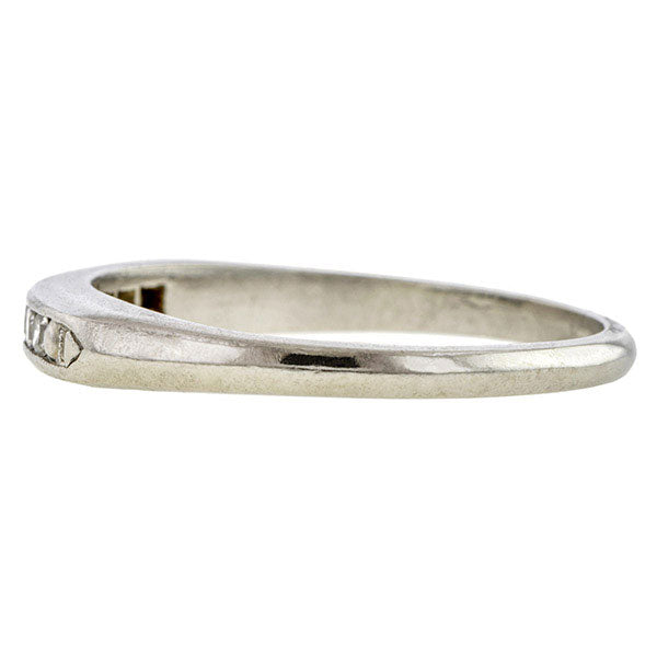 Vintage ring: a Platinum Diamond Wedding Band sold by Doyle & Doyle vintage and antique jewelry boutique.