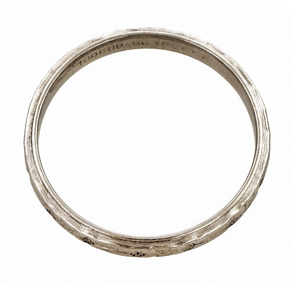 Vintage ring: a Platinum Wedding Band sold by Doyle & Doyle vintage and antique jewelry boutique.