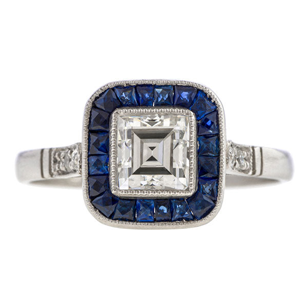 Art Deco ring: a Platinum Emerald, Round Brilliant Cut Diamond And Sapphire Engagement Ring sold by Doyle & Doyle vintage and antique jewelry boutique.