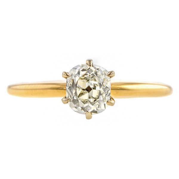 Vintage ring: a Yellow Gold Solitaire Cushion Cut Diamond Engagement Ring sold by Doyle & Doyle a vintage and antique jewelry boutique.