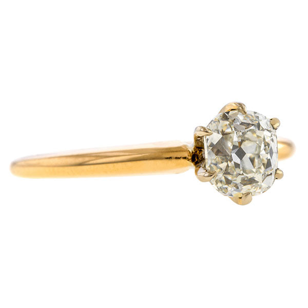 Vintage ring: a Yellow Gold Solitaire Cushion Cut Diamond Engagement Ring sold by Doyle & Doyle a vintage and antique jewelry boutique.