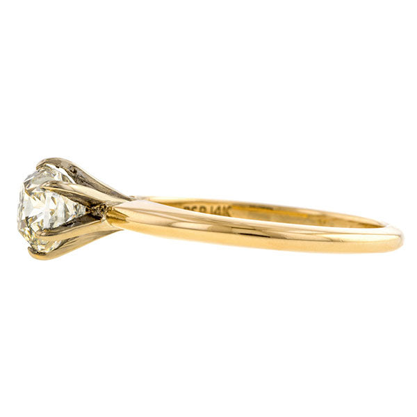 Vintage ring: a Yellow Gold Solitaire Cushion Cut Diamond Engagement Ring sold by Doyle & Doyle a vintage and antique jewelry boutique.