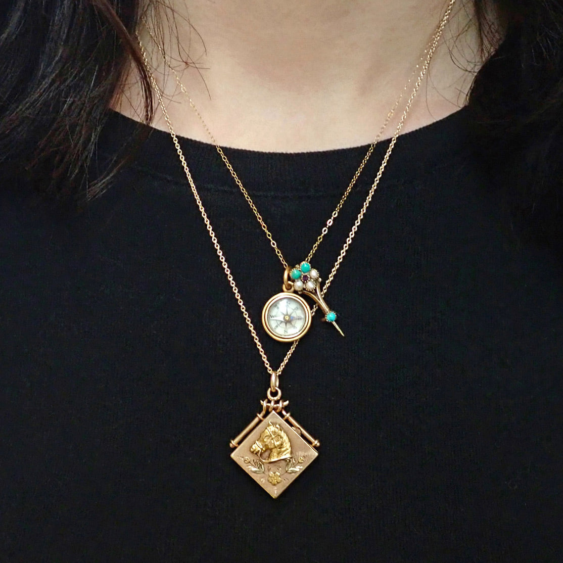 Victorian layered antique gold necklaces, horse locket, compass pendant from Doyle & Doyle 107658N 107656P 107576N
