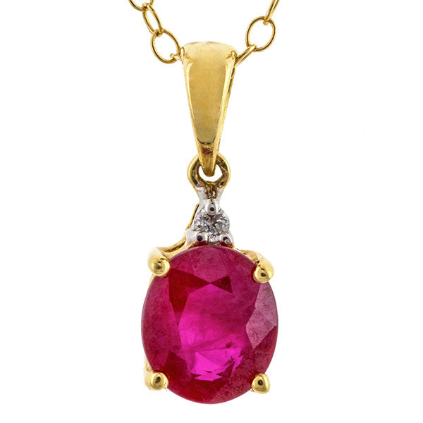 Pendant: a Yellow Gold With Oval Ruby And Diamond Pendant sold by Doyle & Doyle vintage and antique jewelry boutique.