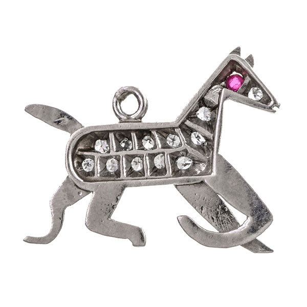 Antique necklaces: a Platinum Dog Charm With Ruby Eye and Single Cut Diamonds sold by Doyle & Doyle vintage and antique jewelry boutique.