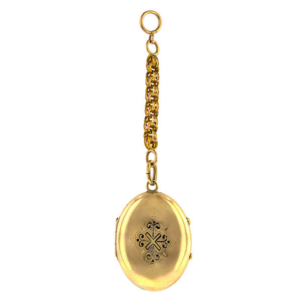 Victorian locket: a Yellow Gold Oval Black Enamel Lockets sold by Doyle & Doyle vintage and antique jewelry boutique.