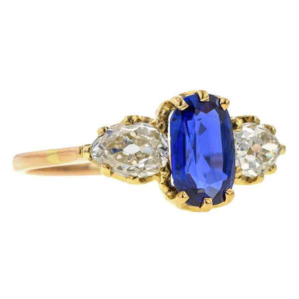 Antique ring: a Yellow Gold Sapphire & Diamond Engagement Ring, sold by Doyle & Doyle an antique and vintage jewelry store.